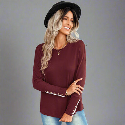 Casual Chic Button Sleeve Sweater - burgundy, relaxed fit, stylish button details on sleeves, perfect for casual outings, city explorations, and evening events.